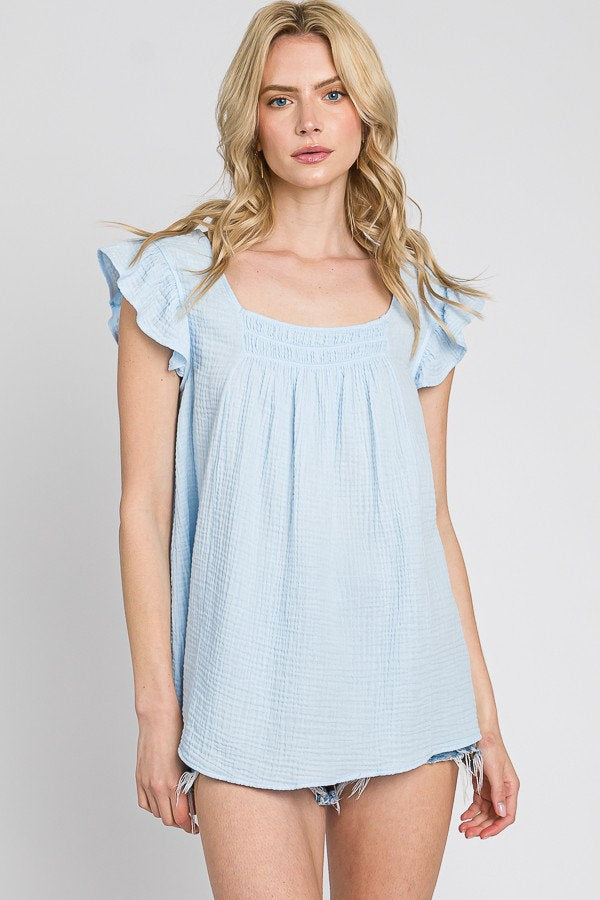 Garment dye, baby blue, short-sleeved, ruffled blouse with a square neckline